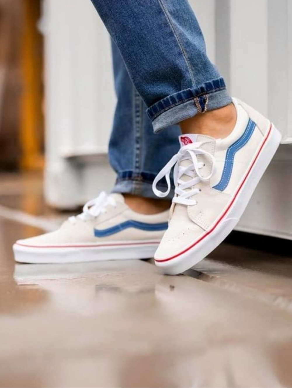 Vans White Sneakers with Blue Stripe and Red Accent